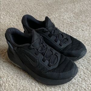 Size 1 Kids Nike All-Black Athletic Sneakers